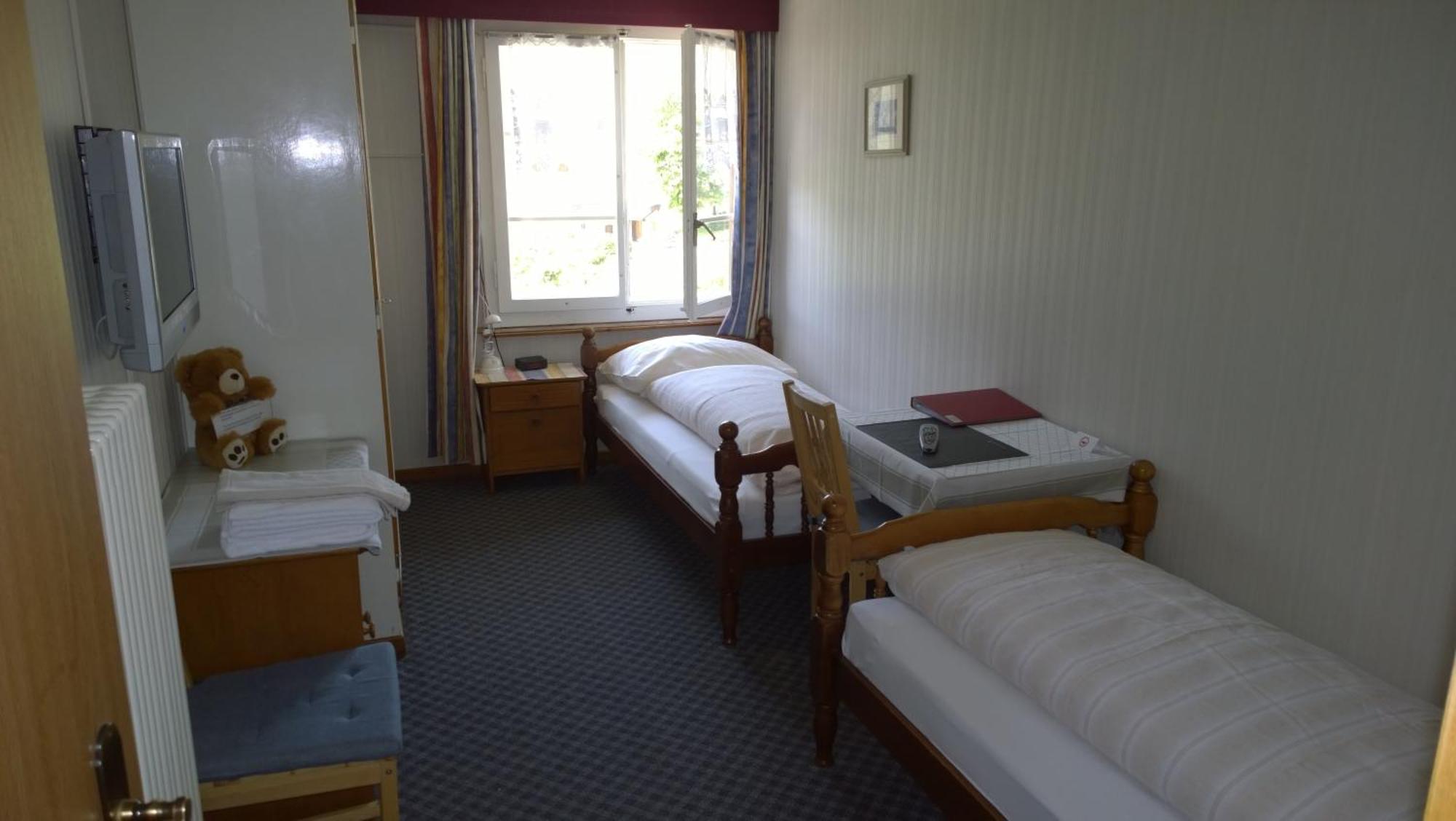 Swiss Lodge Hotel Bernerhof Wengen Rom bilde